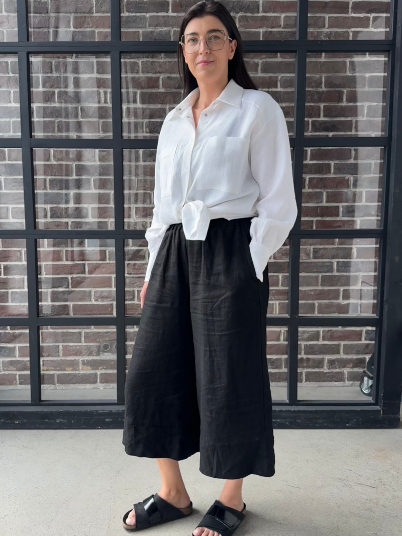 Plačios lininės culotte modelio kelnės