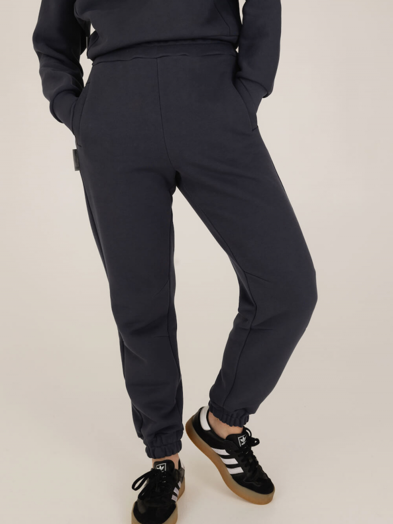 Siaurėjančios laisvalaikio kelnės su kišenėmis